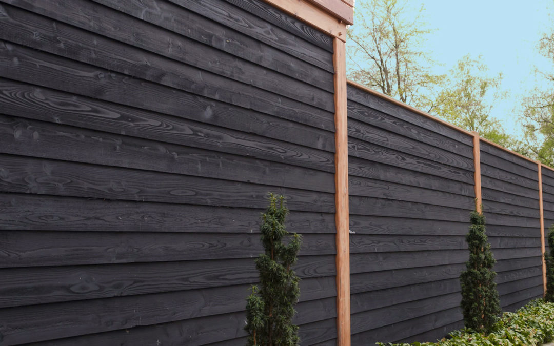 Stain your fence black!